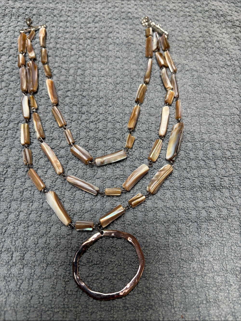 Three-Strand Brown Shell Bead Necklace with Circular Pendant